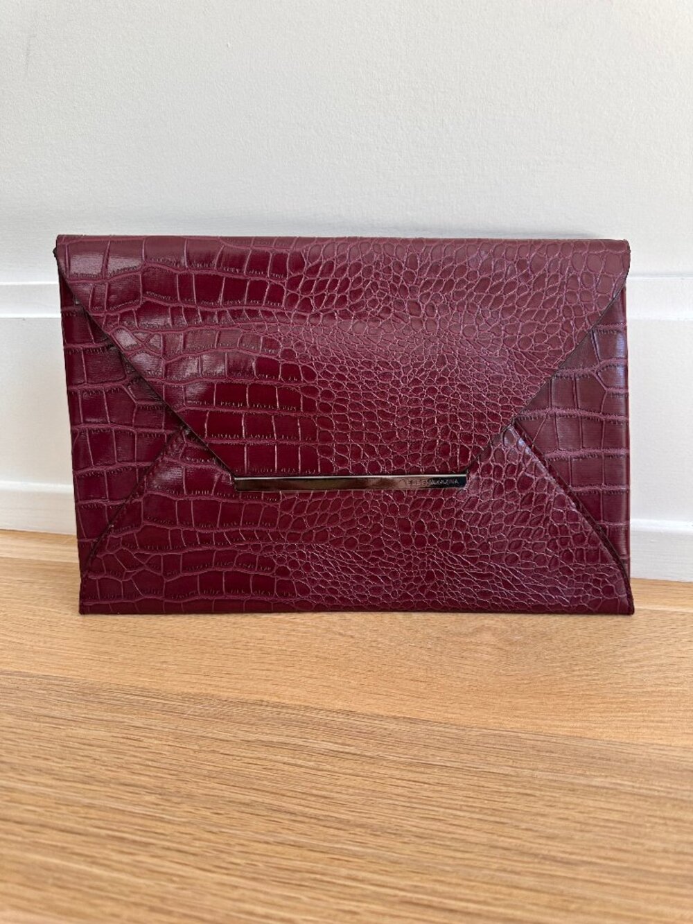 BCBG MAX AZRIA Faux Crocodile Envelope Clutch in Burgundy with Gold Accent